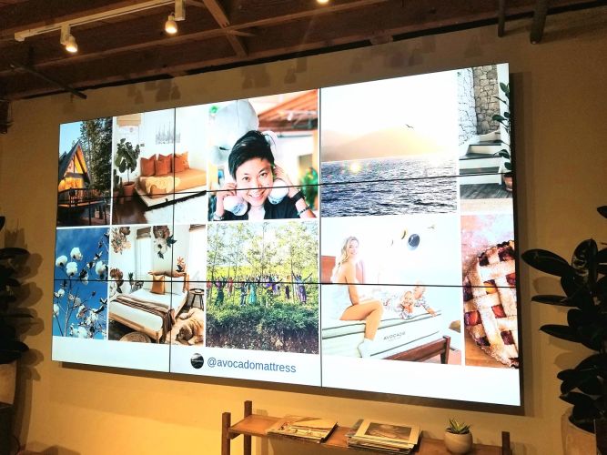 Video wall displaying lifestyle images in a retail space