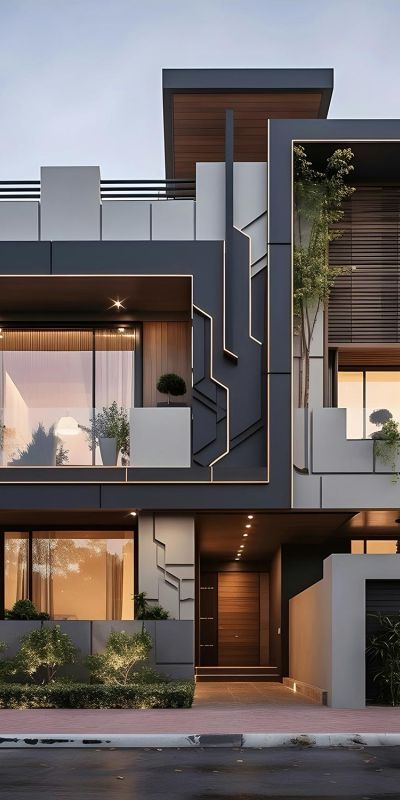 Modern home exterior with geometric design and warm interior lighting